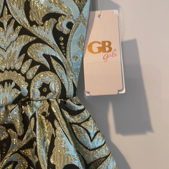 Brand-new with the tech girls dress size 12 brocade fabric with black lining. - Picture 4 of 9